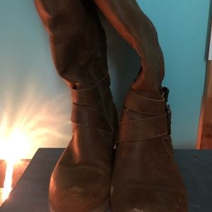 Women’s riding boots. Decorative zipper on outside